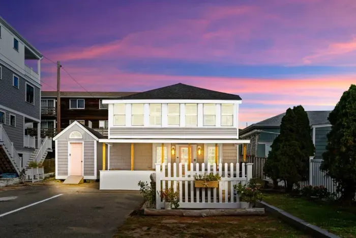 View of property from Railroad Ave. This is a two-family property, with a 2 bedroom 1 bathroom on the ground level, and 2 bedroom 1 bathroom on the second level.
