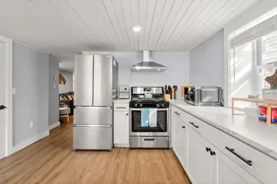 Bottom unit: Newly renovated kitchen, fully stocked with cookwar and, all new appliances