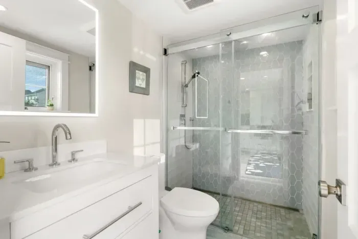 Full bathroom with walk-in tiled shower