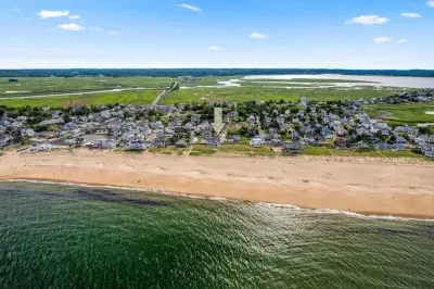 Aerial view, across the street from the beach, large private deck, walking to all the bars & restaurants including the Sunset Club, Riptide Cafe, and The Cottage Creamery!