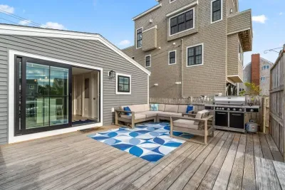 Large private back deck with gas grill