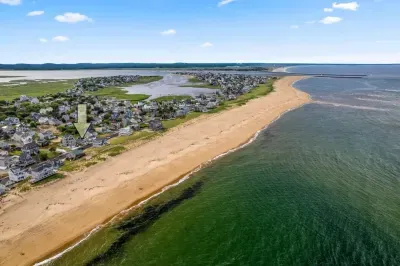Aerial view, across the street from the beach, large private deck, walking to all the bars & restaurants including the Sunset Club, Riptide Cafe, and The Cottage Creamery!