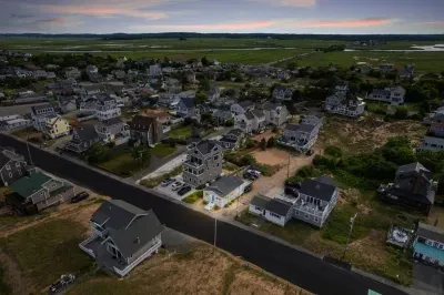 Aerial view, across the street from the beach, large private deck, walking to all the bars & restaurants including the Sunset Club, Riptide Cafe, and The Cottage Creamery!