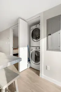 Washer and dryer located right off of the kitchen