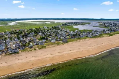Aerial view, across the street from the beach, large private deck, walking to all the bars & restaurants including the Sunset Club, Riptide Cafe, and The Cottage Creamery!