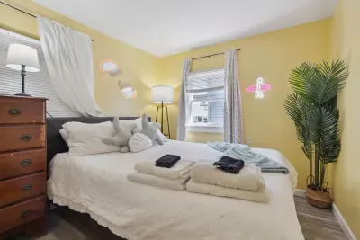 Entire master bedroom remodeled from the floors to the walls to of course, the bed: a brand new memory foam queen size bed with USB enabled lamps.