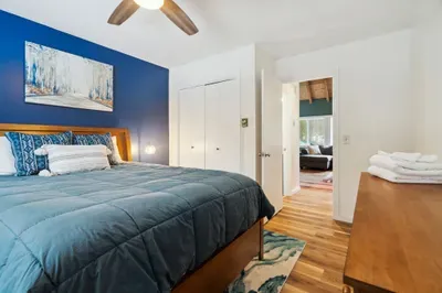 First floor bedroom with queen bed
