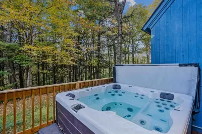 Hop in this fabulous 7-person hot tub situated overlooking the great back yard!