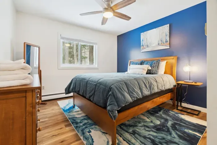 First floor bedroom with queen bed