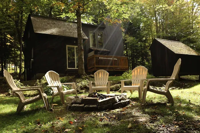 Cozy up by the firepit! 6 chairs are provided for your convenience. The fire pit is unavailable during the winter months
