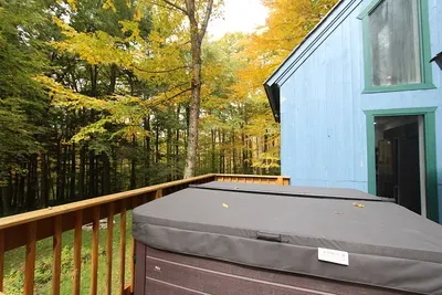 The hot tub - covered. Please keep the cover on when not in use to keep this tub toasty warm.
