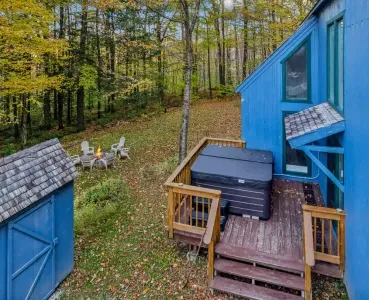 An aerial view of the deck, firepit and hot tub!