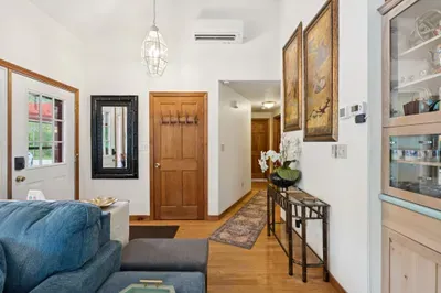 The living area with plenty of seating for everyone, a Queen pullout sofa, and a smart tv!