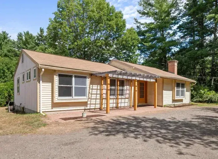 Welcome to The Teahouse! This home is nestled by the Lamprey river in the heart of Epping, NH