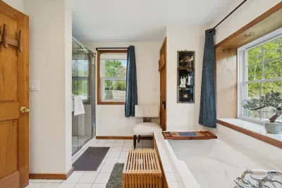 The ensuite with clean towels provided for all guests. It has a brand new standing shower!