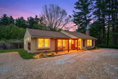 Welcome to The Teahouse! This home is nestled by the Lamprey river in the heart of Epping, NH