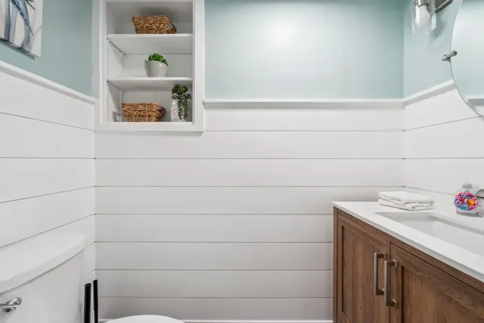 Newly renovated half bathroom located on the first floor