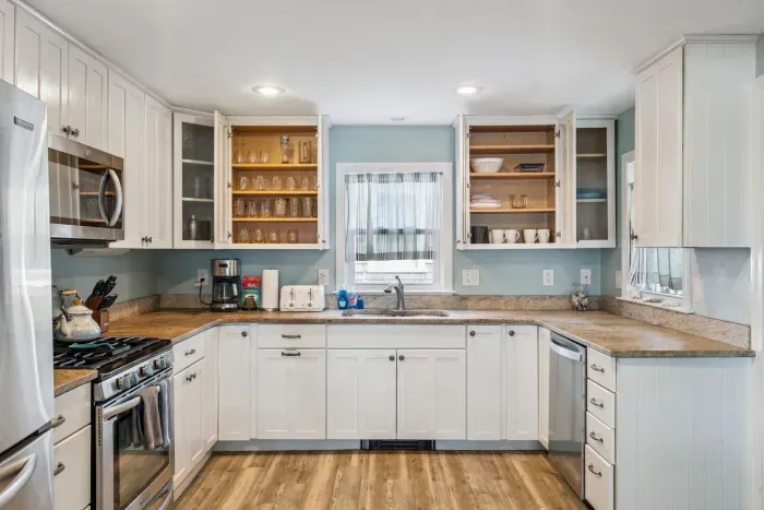 Fully equipped kitchen with all major appliances and dishware