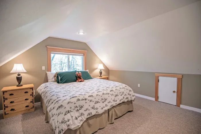 The primary loft bedroom with a king bed! Clean linens and towels provided
