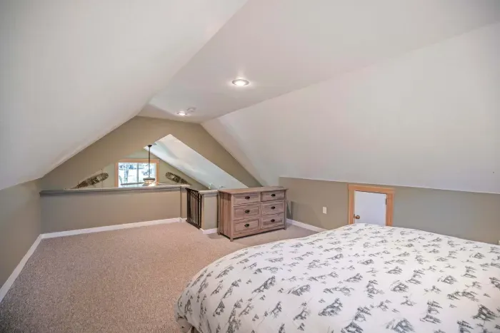 The primary loft bedroom with a king bed! Clean linens and towels provided