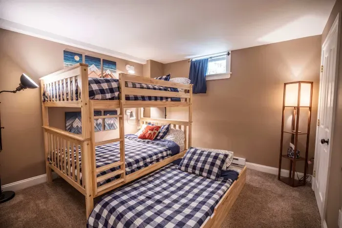 Bedroom #4 with a full over full bunkbed, and a twin trundle bed. Clean linens and towels provided.