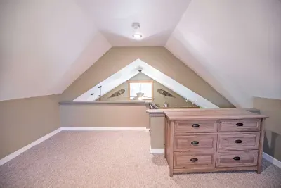 The primary loft bedroom with a king bed! Clean linens and towels provided