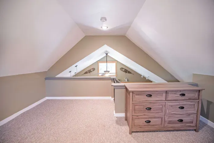The primary loft bedroom with a king bed! Clean linens and towels provided