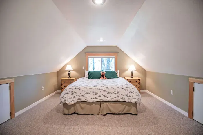 The primary loft bedroom with a king bed! Clean linens and towels provided