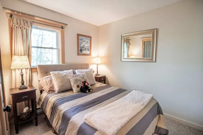 Bedroom #3 with a queen bed. This bedroom is on the main floor. Clean linens and towels provided.