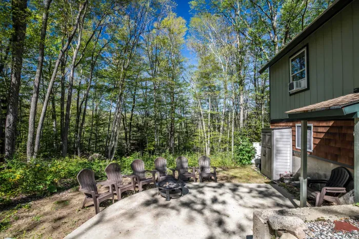 The patio featuring a firepit and gas grill!