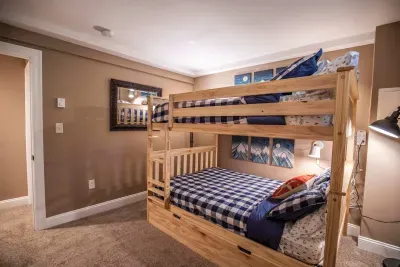 Bedroom #4 with a full over full bunkbed, and a twin trundle bed. Clean linens and towels provided.