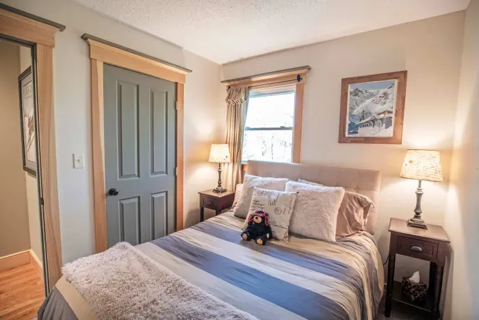 Bedroom #3 with a queen bed. This bedroom is on the main floor. Clean linens and towels provided.