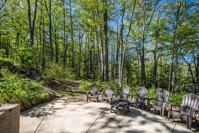 The patio featuring a firepit and gas grill!