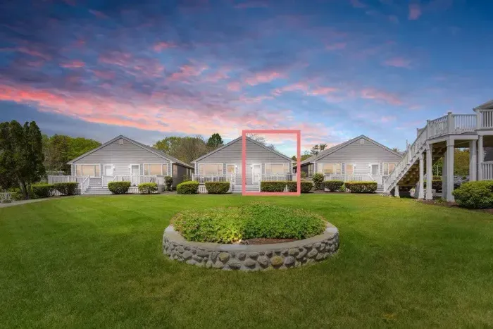 Front of unit. Beautiful open common area perfect for lounging and sunbathing