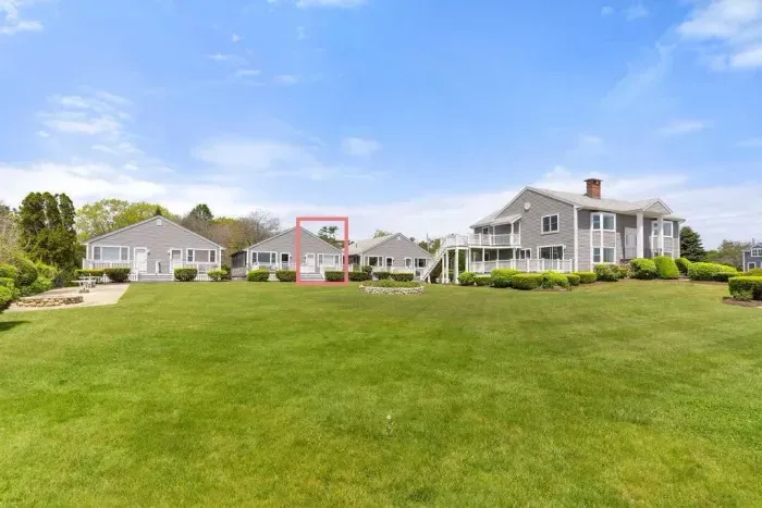 Front of unit. Beautiful open common area perfect for lounging and sunbathing