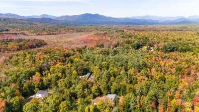 Aerial view of the neighborhood with Mount Washington in the background