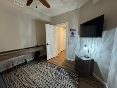 The game room is now in this room! Smart TV with shuffle board!