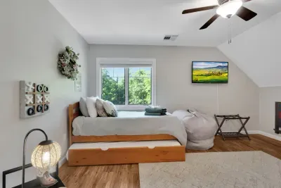 Bedroom #2 with two twin beds, each have a trundle bed. There is a Roku TV in this room and tic tac toe! Total of 4 beds in this room
