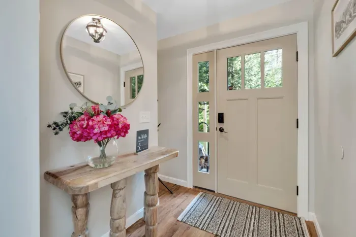 Entrance located on the first floor, the door goes out towards the firepit