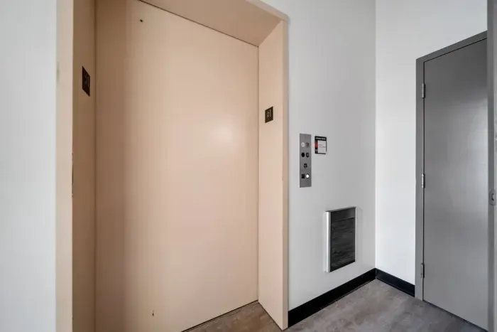 Elevator on ground level to our front entrance in the common courtyard