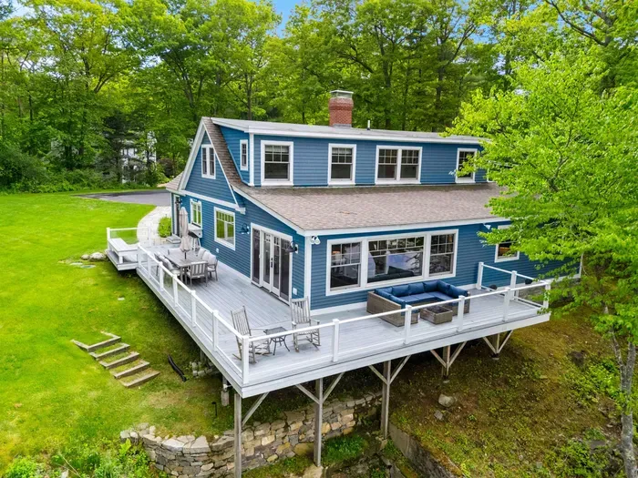 Absolutely stunning view of the Creekhouse from the water. Please note that the lawn has an uneven, elevated edge where it meets the creek. We ask that all guests, especially those with children, remain cautious near the waterfront