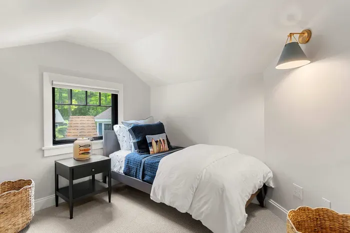 Fourth bedroom located off of the second level primary. Two twin beds both equipped with clean and 100% cotton linens.