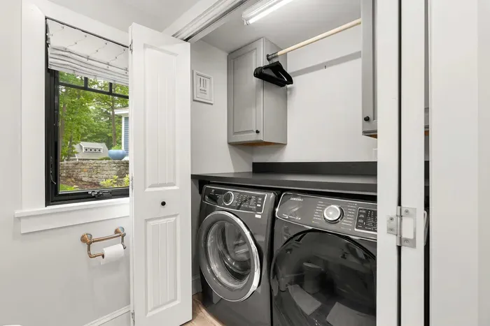 Full size washer and dryer located in the power room on the first level.