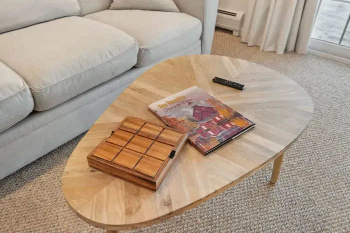 The downstairs family room with Queen sleeper sofa, smart TV, puzzles, and access to the back yard. Clean linens provided for the sleeper!
