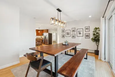 This dining table is beautiful! Seating for 10 plus seating at the island allows everyone to have a comfortable place to eat!