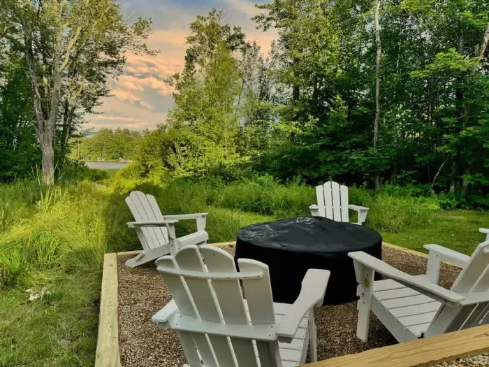 The backyard area is the perfect spot to relax in the summer time. This backyard is surrounded by trees with easy access to the lake!