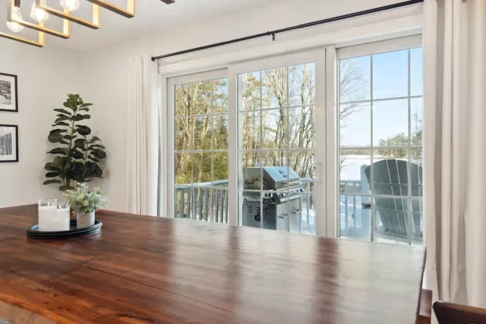 The view from the dining table out to the deck - there is access to the backyard off of this deck