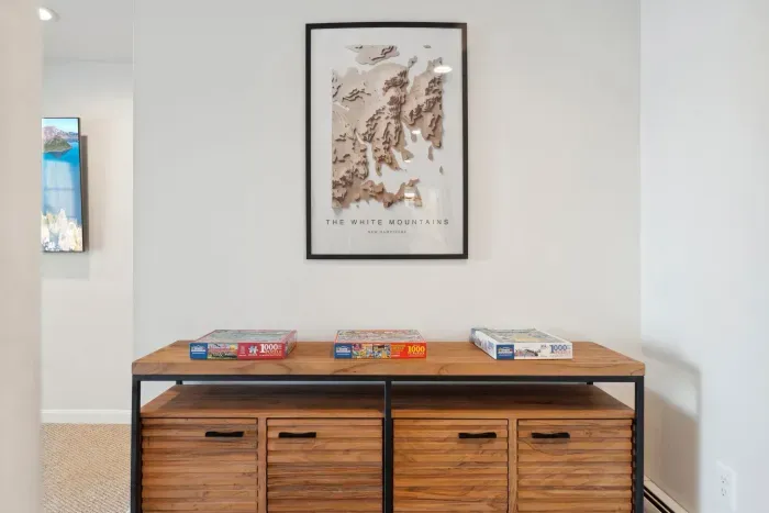 The downstairs family room with Queen sleeper sofa, smart TV, puzzles, and access to the back yard. Clean linens provided for the sleeper!
