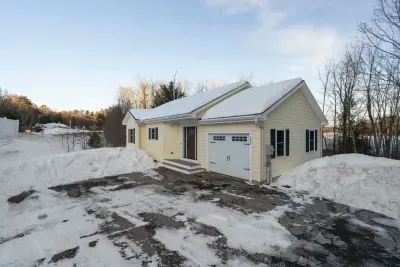 Parking for up to 3 vehicles. The driveway is steep so please be careful in the winter. Four wheel drive is necessary if there is snow. Please no parking in the garage