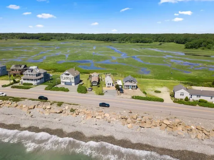 Aerial view, across the street from the ocean, large private lawn area and roof deck to relax, sunbath and grill